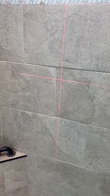 Tile shower laser level #diy #handyman #homehacks