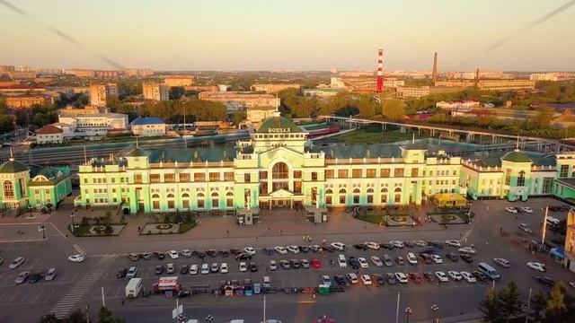 The central railway station of the city of Omsk. The building of the station. Sunset. Russia, From