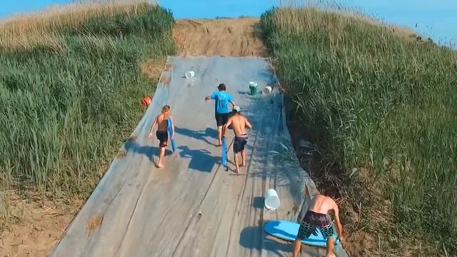 KONA TEAM ON HOMEMADE SLIP AND SLIDE