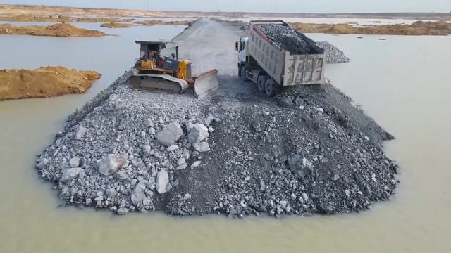 Строительство, засыпка, дорога через озеро