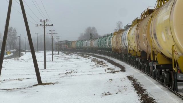 2ТЭ116-1050 + ЧМЭ3-5207 близ станции Тарту 2TE116-1050 + ČME3-5207 near Tartu station