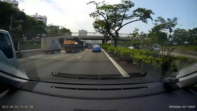 Singapore - Heavy and slow moving vehicle taking up more lanes on our roads.