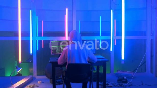 Criminal Hacker Working in the Evening on Computer in Big Office | Stock Footage - Envato elements