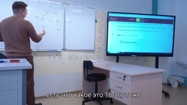 Задача про 2 заряженных шарика к уроку 93" Решение задач на силу Кулона"