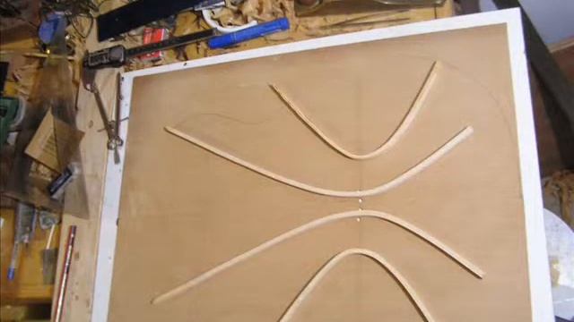 Buckham Guitars Cedar and Old Brazilian OM with Falcate top and live back.