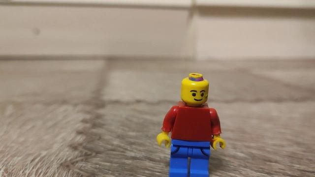 на lego человечка падает деталька lego