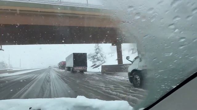Trucks chaining up. Exit 10 WB I 80 in Reno Nevada. California Donner Pass 01/16/2023