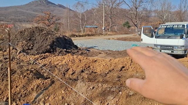 Сделали планировку участка, дренаж,скважину, септик, уложили электрокабель в землю.