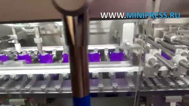 Тестирование автоматической машины розлива жидкостей в дой-пак пакеты DG-18 Minipress.ru