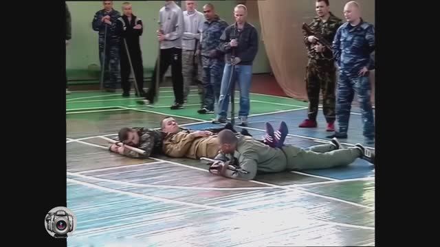 Аркадий Алексеевич Кадочников объясняет основы нижней акробатики с автоматом. 20