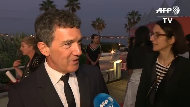 Antonio Banderas reacts after winning best actor at Cannes