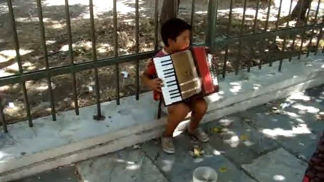 Child busking for change