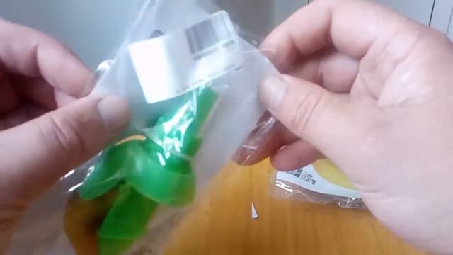 Два заказа в одной посылке - ручной цитрусовый пресс и насадка на бутылку для полива с joom джум