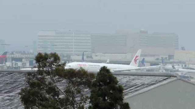 China Eastern Boeing 777-300ER [B-2005] takeoff from LAX