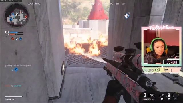 Talia tries to blow out the fire in the game????