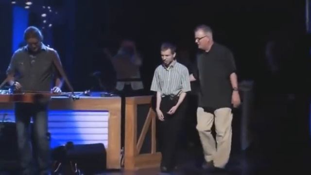 Josh Turner singing with autistic boy