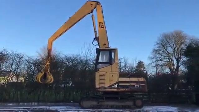 CATERPILLAR 320L HIGH CAB LONG REACH MATERIAL HANDLER WITH 5 TINE GRAB