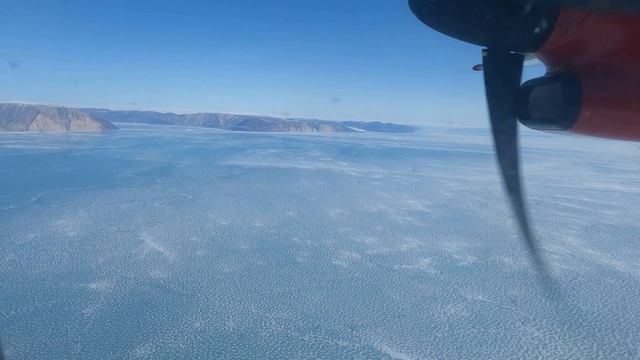 Landing in Qaanaaq, Greenland, the 2nd northernmost town in the world