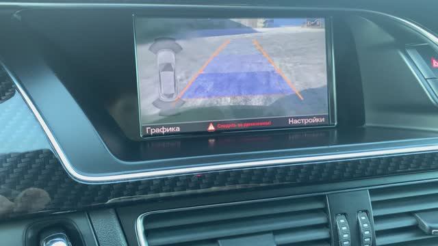 Работа "умного" омывателя камеры заднего вида на Audi A4 B8 Avant