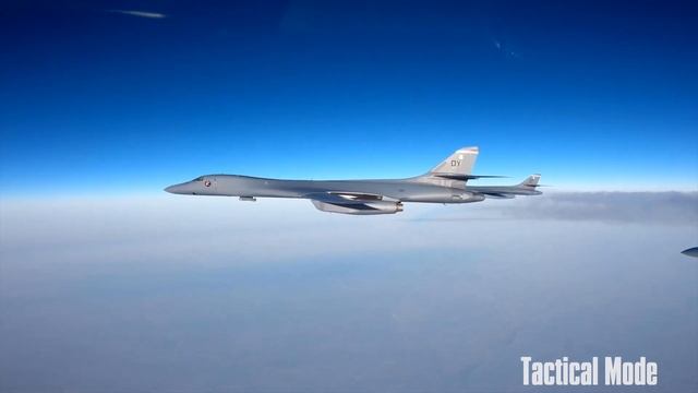 LOW AND FAST ARTIC BOMBING RUN - USAF B-1 Bombers And F-16 Fighting Falcons Train Over Greenland