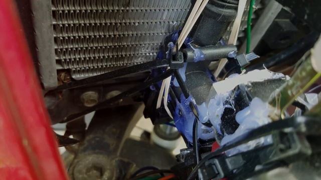 Robot that bangs a cowbell when you turn signal