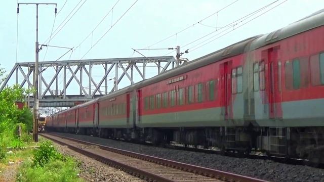 The Fast and Furious 110 kmph Rajdhani express Passing Emu Local under the Bridge