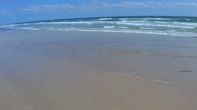 Waves by the big blue ocean