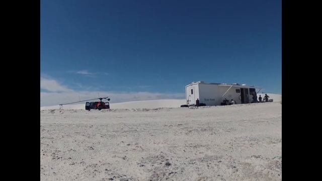 Camera Hogs Crane in White Sands