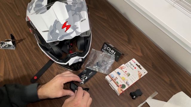Scorpion EXO-AT950 helmet with a Chin Mounts camera mount using Sugru mouldable glue.