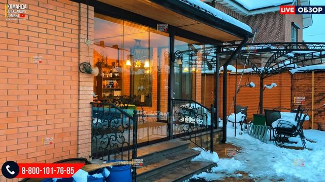 Безрамное остекление террасы зимой