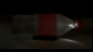 Laser pulse shooting through a bottle and visualized at a trillion frames per second