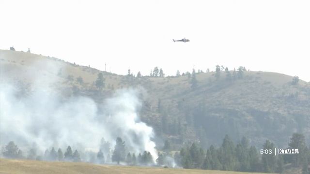 Elmo Fire destroys structures as it continues to grow