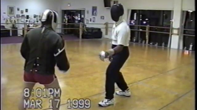 FENCING MASTER MEL NORTH WITH NESTOR ROSARIO RECIEVING EPEE AND SABER LESSONS 1999
