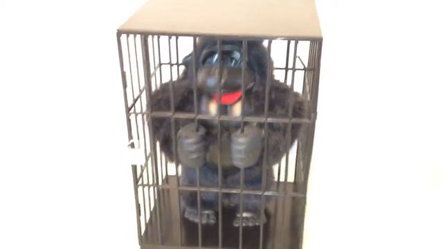Gorilla trapped in cage motion activated children's toy