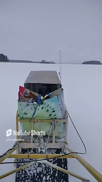 еду на самодельной мотособаке по льду финской о залива