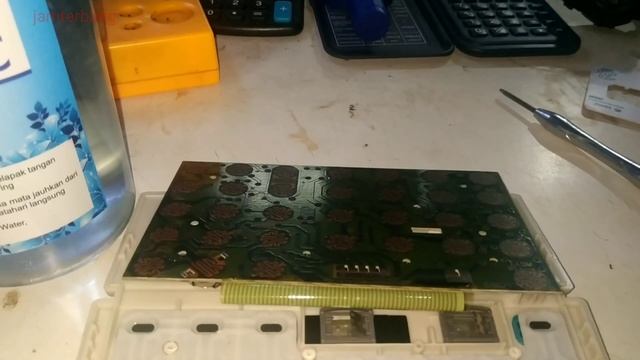 cara memperbaiki kalkulator tombol macet,eror,tidak berfungsi