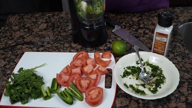 Homemade Salsa (Pico De Gallo)  With Tomatillos, Tomatoes, Jalapenos, And A Splash Of V8 Juice