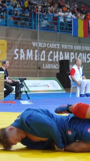 Double leg lock battle! Ykylas MURAT (KAZ) proved stronger, forcing Tichomir NARVIS (LTU) to tap out