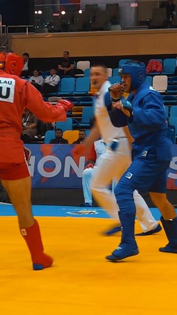 Petro DAVYDENKO (UKR) went all-in against Gheorghe BODIRLAU (ROU) and they both flew off the mat