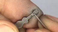 Artist Carves Guitar on the Tip of Pencil