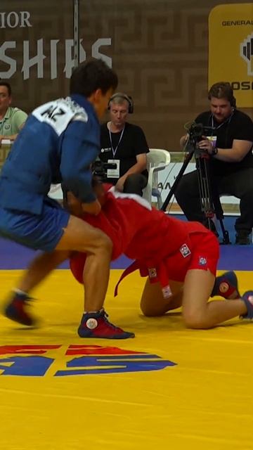 Throwings for the victory Nurzhan TUMYRZAYEV (KAZ) in the bout against Nematjon KHUDAYBERGANOV (UZB)