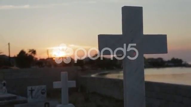 052282651 white cross graveyard sunset