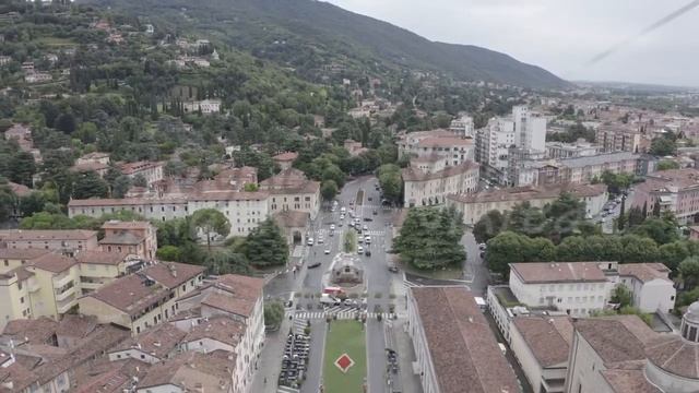 D-Log. Brescia, Italy. Monument to Arnaldo da Brescia. Arnaldo Square, Aerial View, Departure of th