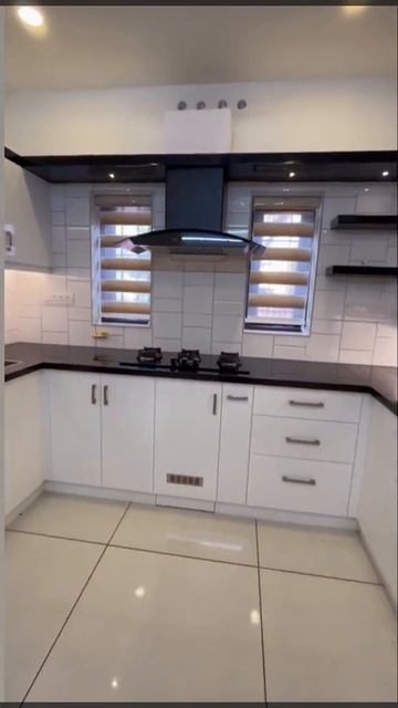 Kitchen interiors #kitchen#black and white theme#XL Interiors #design with Cynthia Alex