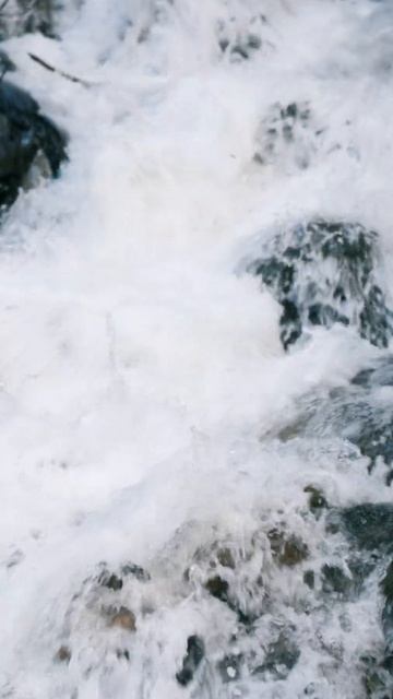 Water Flowing Down on Big Rocks