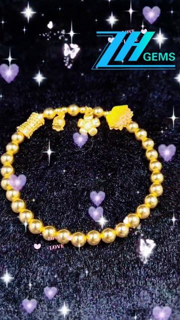 GN-20250227-04 The S925 gold toned silver bead bracelet comes with an exquisite flower pendant.