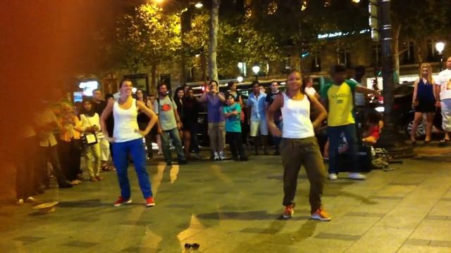 Street dancers on Champs Elysees Ave. Paris, France