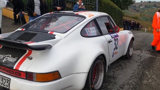 Toyota Corolla WRC and Porsche 911 stage start