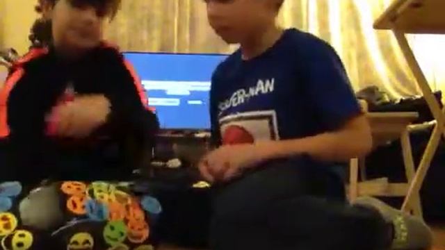 Kids wrapping a Bugatti Veyron