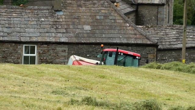 Baling in Swaledale. Some people PAY for a rolller-coaster ride this this!